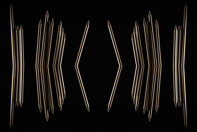 Wooden graphite pencils and sharpener on kraft-toned desk